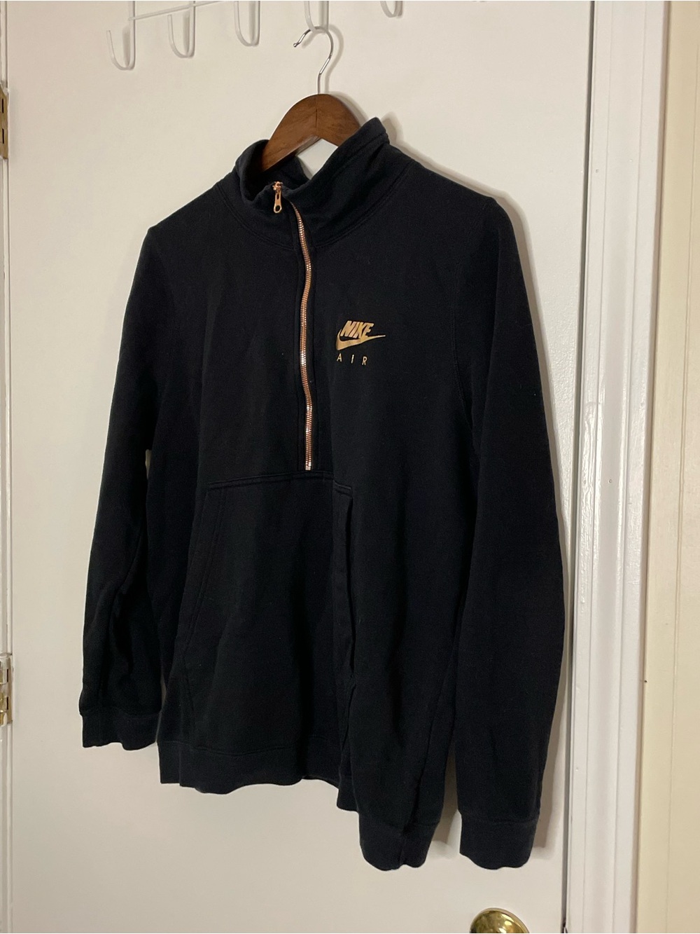 Nike Black Half-Zip Pullover Sweatshirt with Gold Swoosh and Zipper